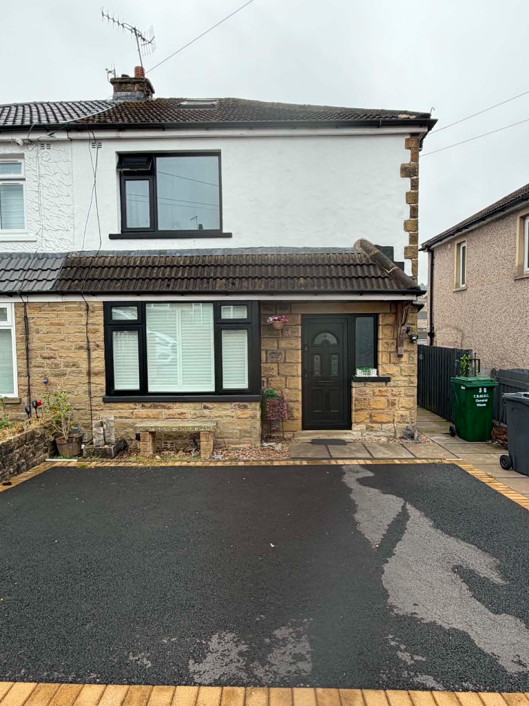 Front of a house after Simply Sprayers sprayed the windows and door anthracite